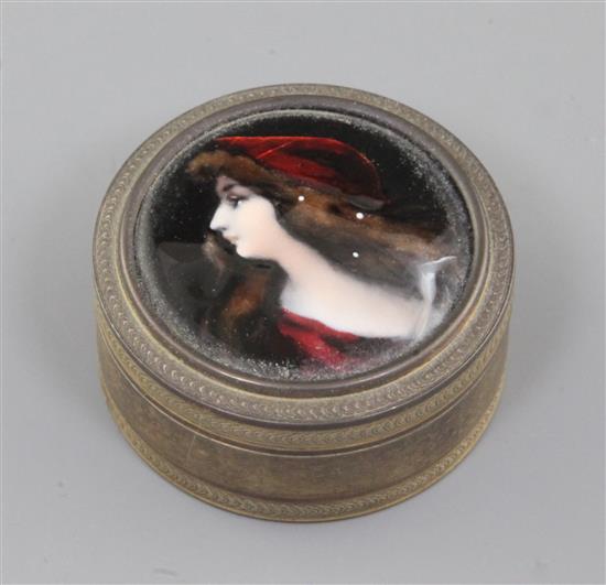 A 19th century French engine turned silver and Limoges enamel circular snuff box and cover, 54mm.